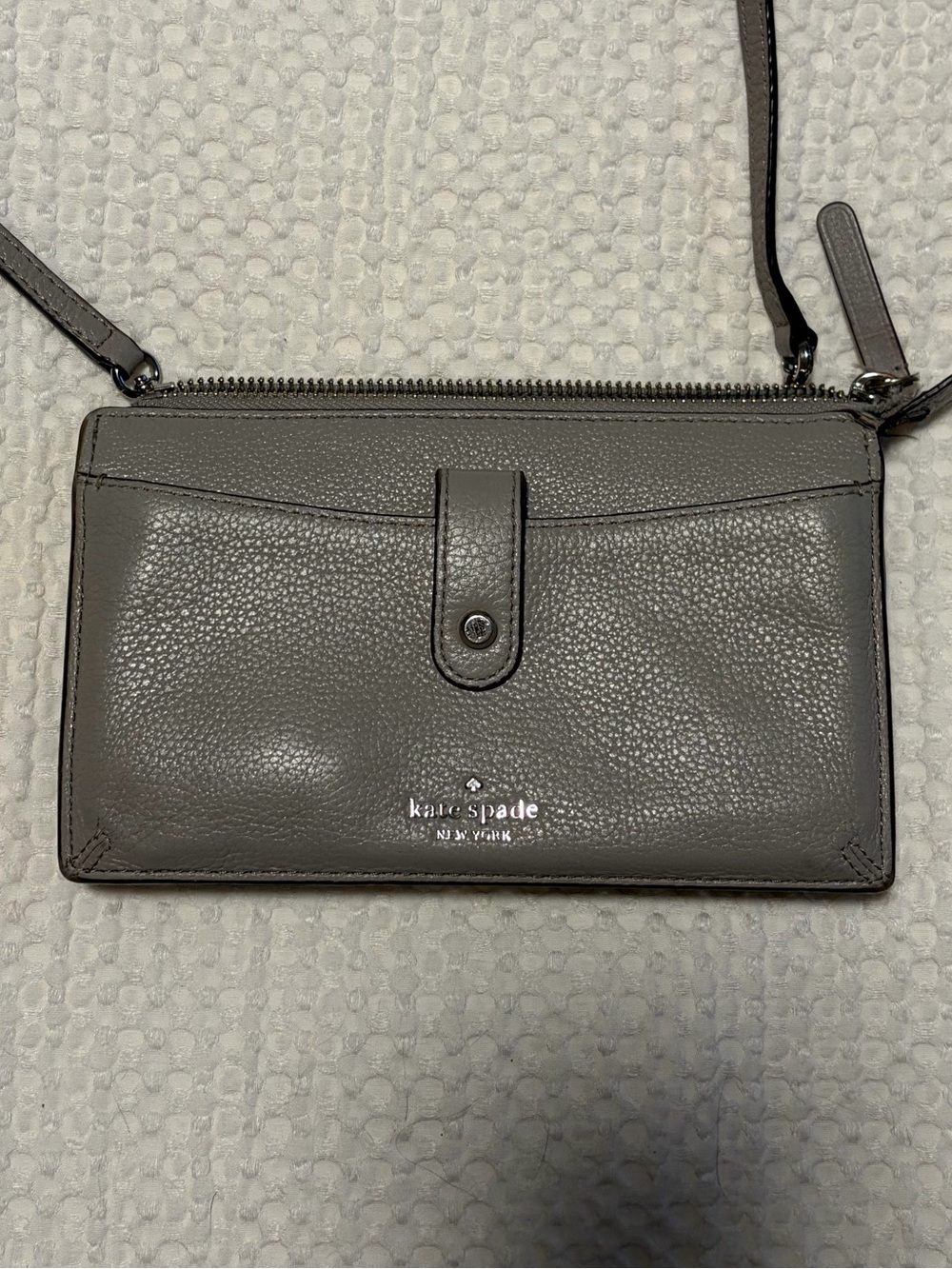Kate Spade gray pebbled leather crossbody bag